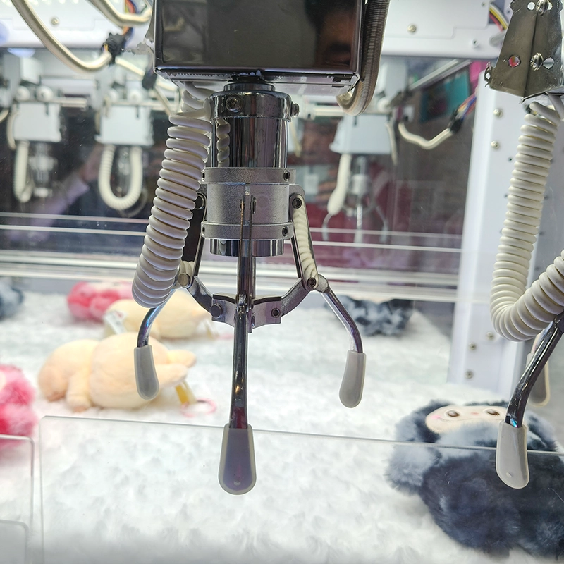 multiplayer arcade claw machine in use